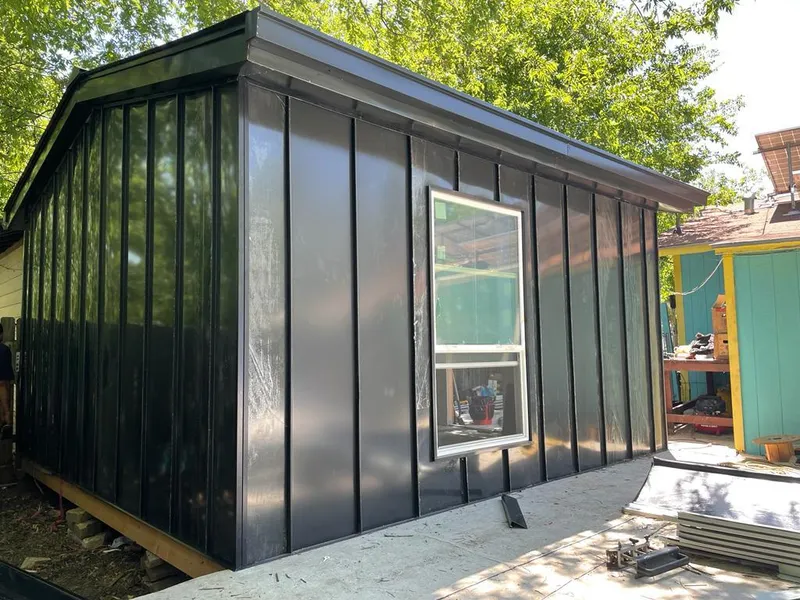 Black standing seam metal wall panels for Roof Inspection in Fairfax